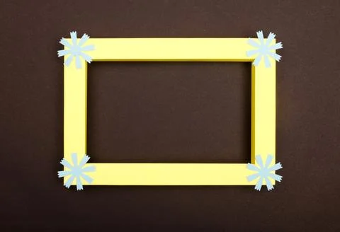 Empty mockup frame with crafting paper flowers isolated on paper background Stock Photos