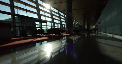 Empty modern airport terminal, high contrast slow motion dolly shot Stock Footage 329627173