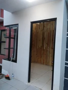 Empty modern building room features bright white walls black window frames an Stock Photos