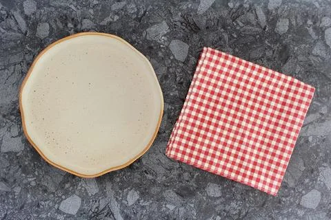 Empty modern ceramic plate on marble table background ,top view Stock Photos