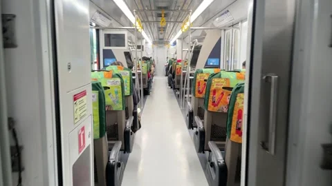 Empty modern commuter train interior with aligned seats Stock Footage 333838310
