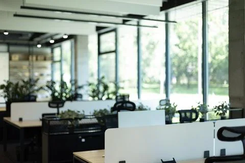 Empty modern coworking office environment with panoramic windows Stock Photos