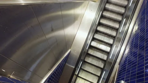 Empty modern escalator, moving staircase going up in subway station Stock Footage 135912058