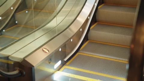 Empty modern escalator steps moving down Stock Footage 343549547