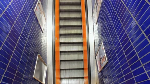 Empty modern escalator in a subway moving up Stock Footage 135909359