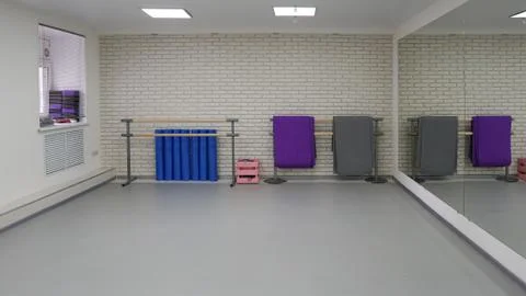 An empty modern hall for dance classes or fitness studio Stock Photos