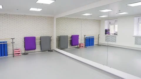An empty modern hall for dance classes or fitness studio Stock Photos