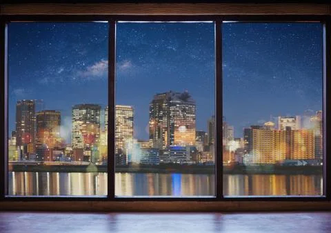 Empty modern interior space with city view at night and starry sky Stock Photos