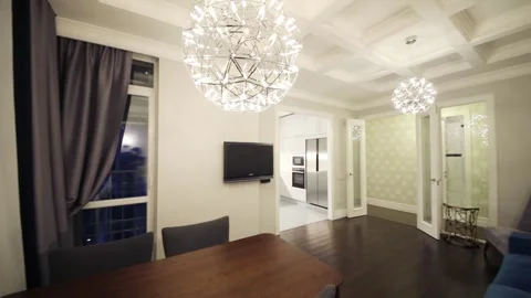 Empty modern living room with sofa, armchair, tv in apartment Stock Footage 276364356