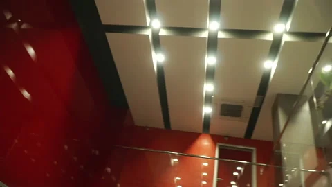 Empty modern office in the evenung, nobody inside with big wall clock. Media Video stock 140614865
