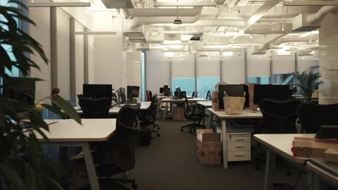 Empty modern office at late hour walk, white wall, chairs and open office doors Stock Footage 184456970