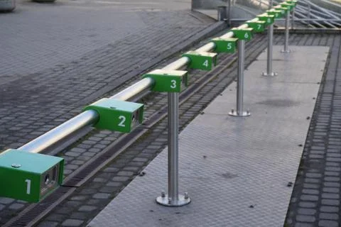 Empty modern Parking for bicycles or scooters, city rental on a Sunny day. Me Stock Photos