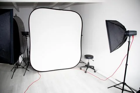 Empty modern photography clear studio interior with two softbox lights and .. Stock Photos