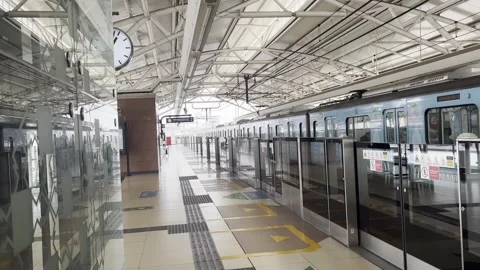 Empty Modern Rapid Transit Station Platform with Automatic Screen Doors Stock Footage 335843198