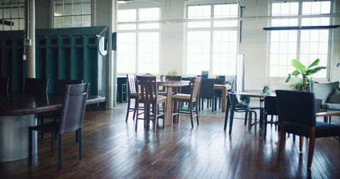 Empty modern renovated industrial tech hipster wood office during the daytime wi Stock Footage 199462596