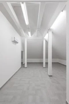 Empty Modern Room with Columns and Tiled Floor Stock Photos