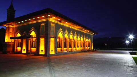 Empty Mosque with orange light illuminating the inner walls Stock Footage 241705500