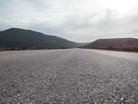 Empty mountain road low section landscape Stock Photos