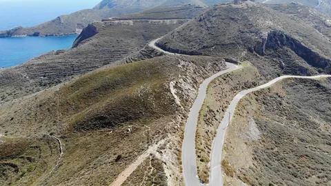 Empty mountain road by the sea Stock Footage 106948519