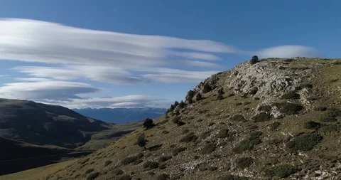 Empty mountain roads in the Pyrenees on sunny day drone aerial 4k Stock Footage 125756512