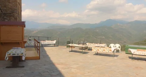 Empty mountain terrace restaurant in Perinaldo, Italy Stock Footage 346859858