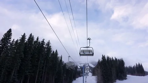 Empty moving cableway and trees in forest at night Vídeo Stock 145333491