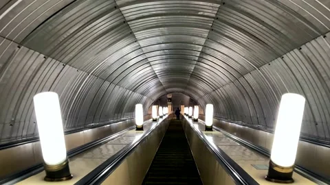 Empty moving downhill escalator in the subway Stock Footage 202204080