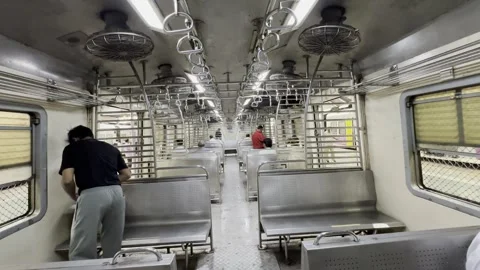 Empty moving local or suburban train in Mumbai, India Stock Footage 255694961