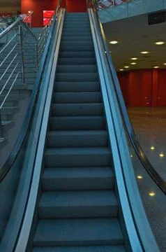 Empty moving stairs in mall going up... Stock Photos