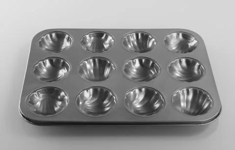 Empty muffins molds Photos