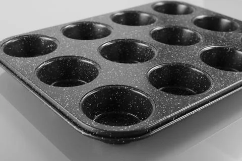 Empty muffins molds Stock Photos