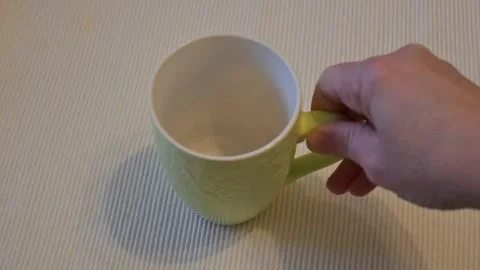 Empty mug placed on table, coffee or kitchen concept, Copy Space Stock Footage 334993094