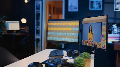 Empty multimedia creative studio with photo editing software on PC display Stock Photos
