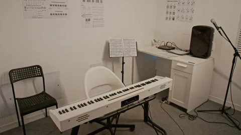 Empty Music Classroom with Digital Piano Standing Ready for Lesson Stock Footage 339186105