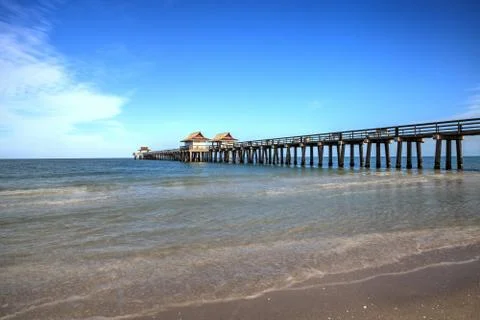 Empty Naples Pier after it was closed off due to the Covid 19 virus outbreak Stock Photos