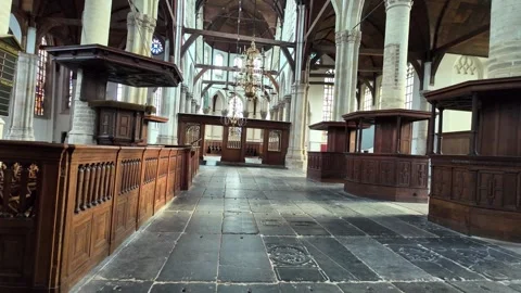 Empty nave in the Oude Kerk in Amsterdam - view of historic interior of the.. Video stock 334209580