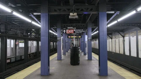 Empty New York Subway Platform As Man Rushes to Other Train During Pandemic 4K Stock Footage