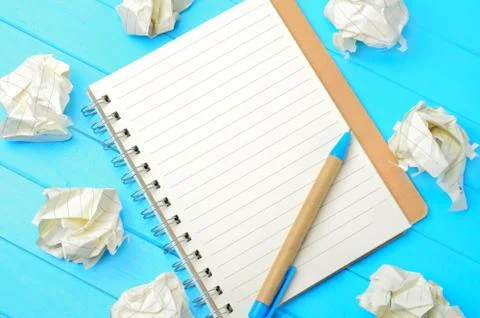 Empty notebook and crumpled paper Stock Photos