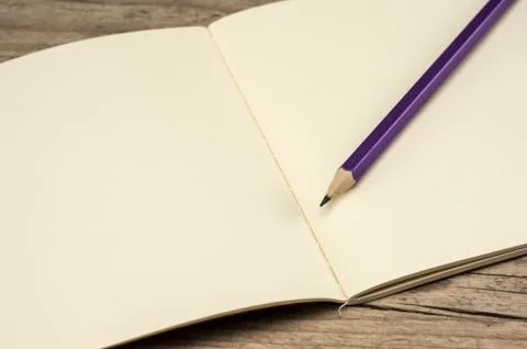 Empty notebook and pencil Stock Photos