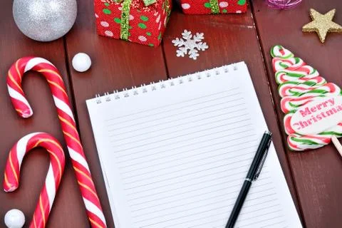 Empty notebook with christmas ornament on table Stock Photos