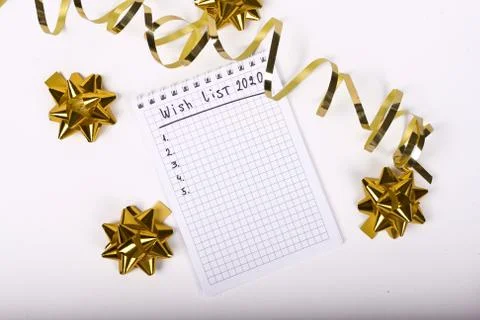 Empty notebook decorated with Christmas decorations on the white background.  Stock Photos