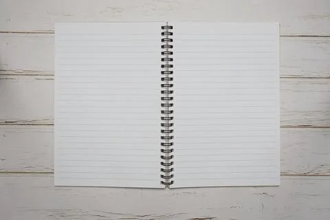Empty Notebook open on wooden background Stock Photos