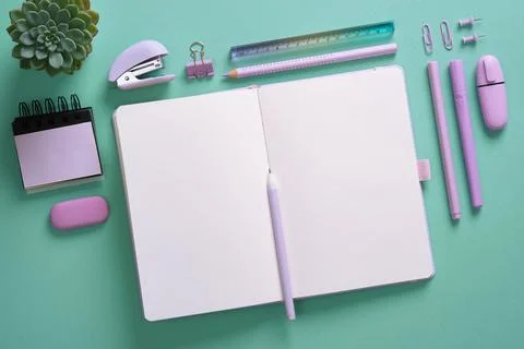 Empty notebook page for your text in frame of pastel color stationery Stock Photos