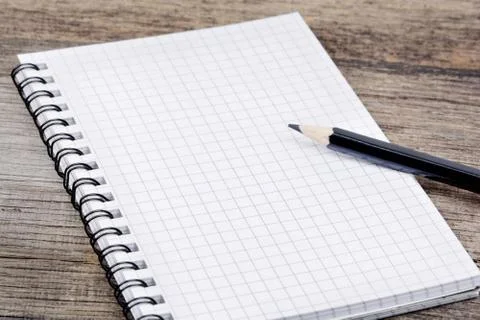 Empty notebook with pencil on table Stock-Fotos