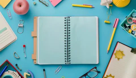 Empty notebook is spread on desk mockup, stationery. back to school concept Stock Photos