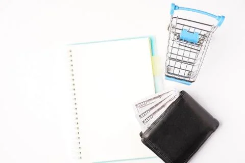 Empty notebook with wallets on white background Stock Photos