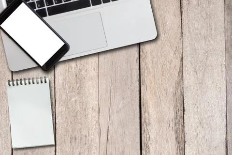 Empty notepad and hot coffee on desk, top view, copy space, business working  Stock Photos