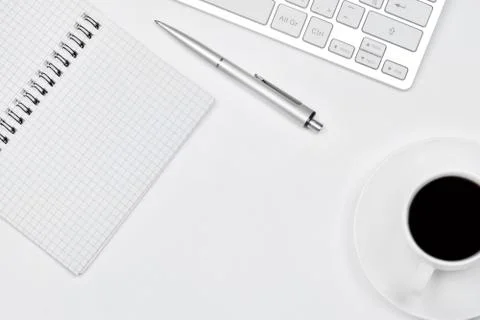 Empty notepad with coffee cup and keyboard Stock Photos