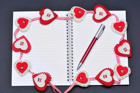 Empty notepad with many hearts shape Stock Photos