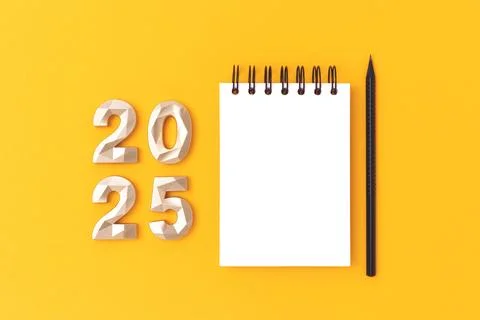 Empty notepad mockup, pencil and golden 2025 numbers on a yellow background. Stock Photos